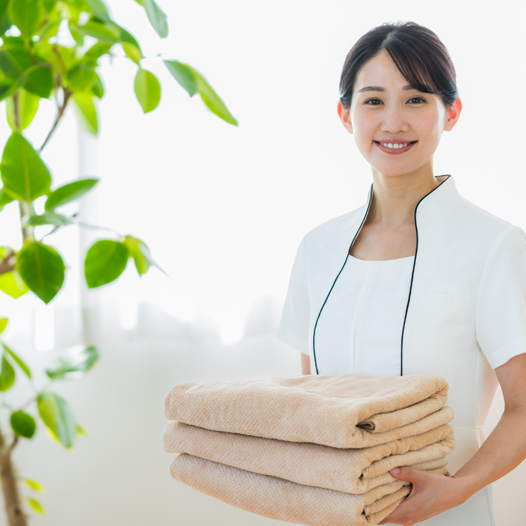 oung esthetician woman smiling, representing the opportunities and support available through esthetician scholarships.